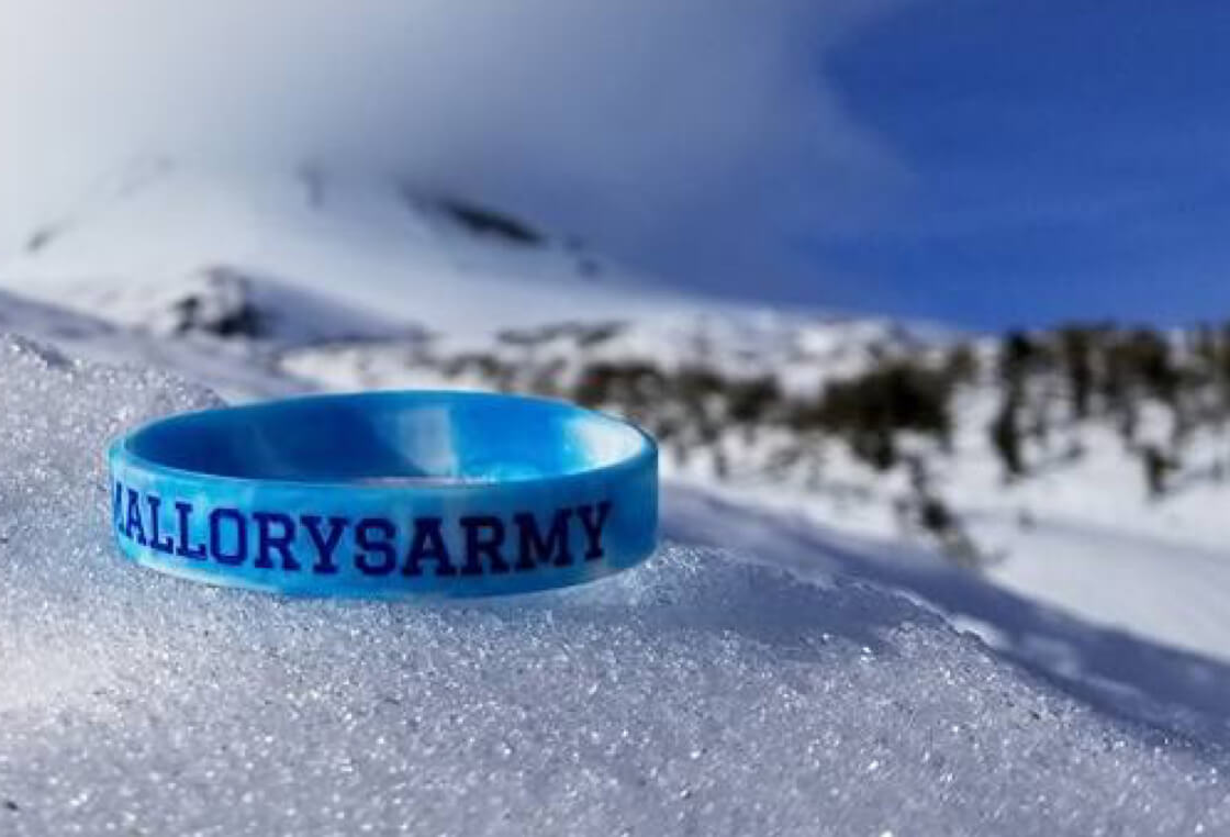Photo of Mallory's Army bracelet in snow